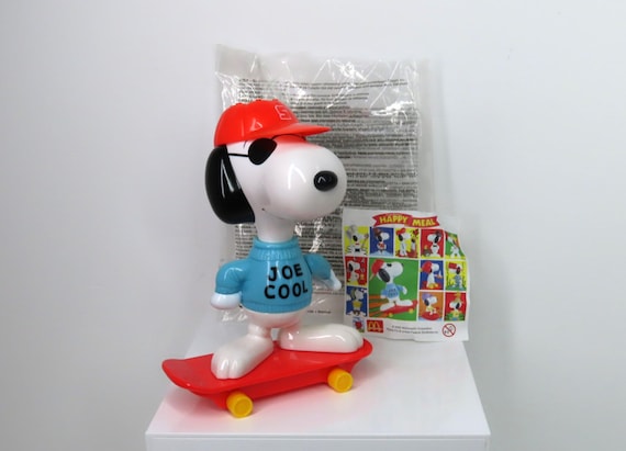 A Vintage Year 2000 Snoopy Joe Cool Skateboarder Plastic Toy