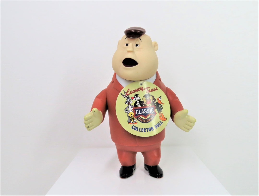 A Vintage 1994 Looney Tunes Mugsy Vinyl Collector Doll Figure With