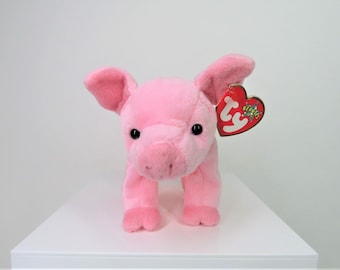 A vintage 2002 TY Beanie Babies Hamlet the pig soft toy, with swing tag.