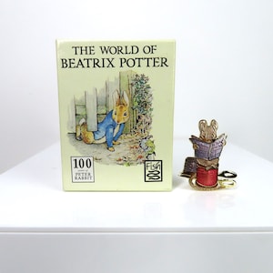 A vintage 1992 Beatrix Potter Tailor Of Gloucester Gentleman Mouse 22ct plated brooch, by FISH.  In original box.