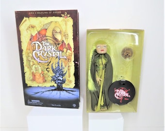 A superb vintage 2001 12" Kira figure with Fizzgig and stand in original box.  The Dark Crystal.