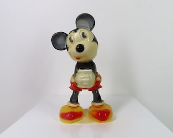 Un portaspazzolino, un portapenne e un portapenne vintage degli anni '60 raffigurante Topolino.