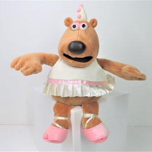 A vintage 2003 Creature Comforts Alvin The Dancing Bear soft toy plush.