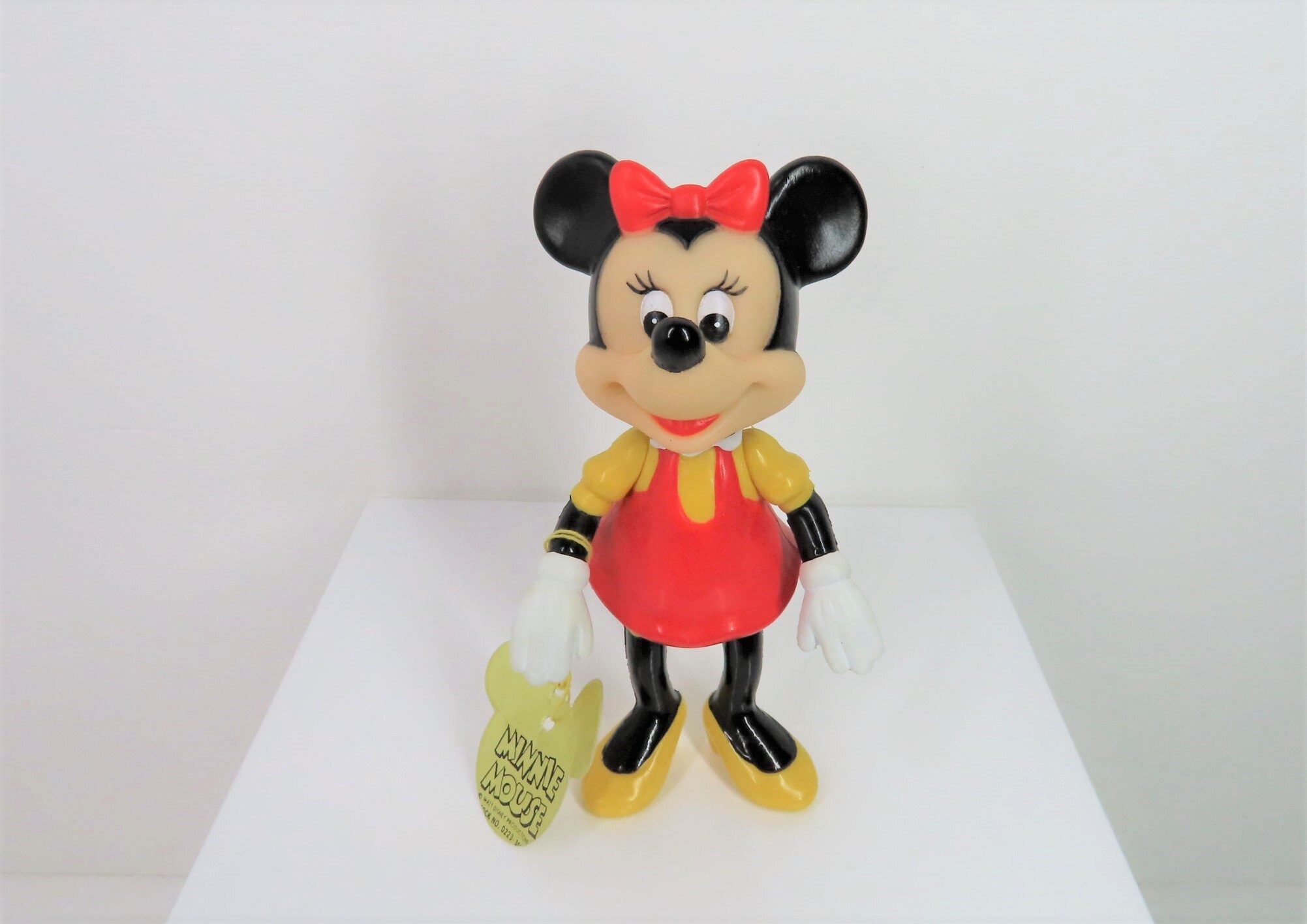 A Vintage 1960s - 1970s Minnie Mouse Figure With Swing Tag and in