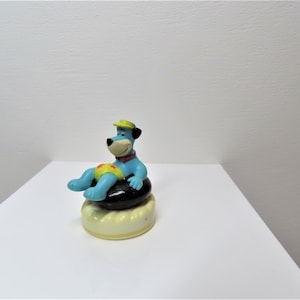 vintage des années 1990 Hanna-Barbera Huckleberry Hound rouleau avec jouet.