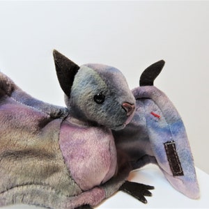 A vintage 1996 TY Beanie Babies Batty the tie dye bat, mint with tag.