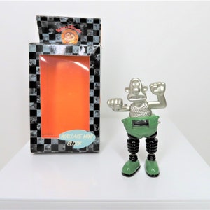 A vintage 2001 Mini clock, Wallace and Gromit The Wrong Trousers, Techno Trousers mini clock.