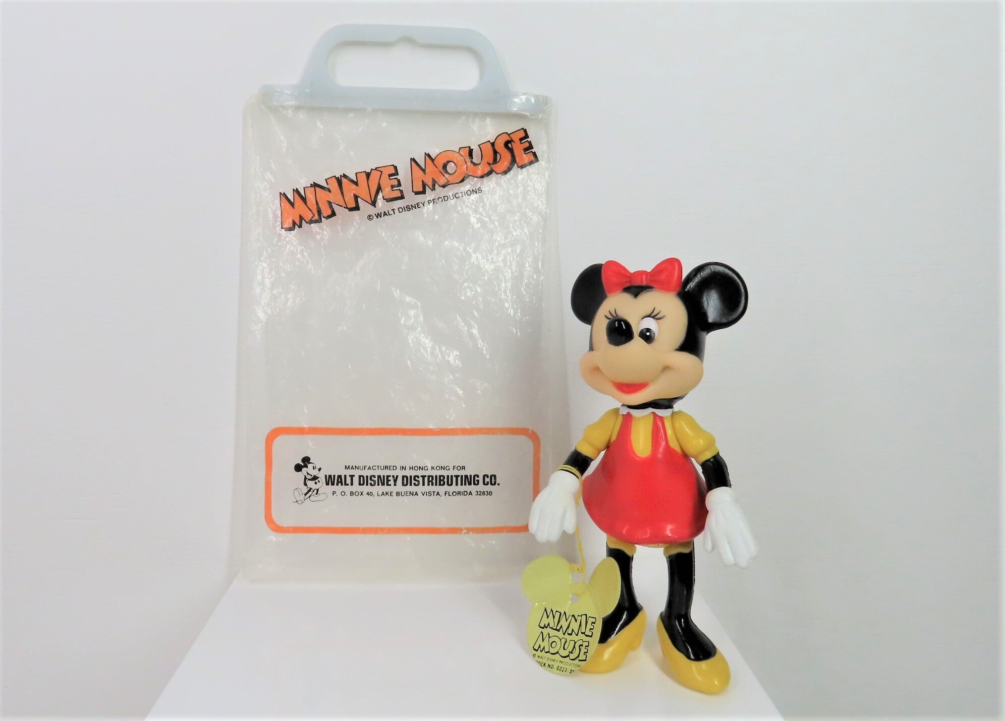A Vintage 1960s - 1970s Minnie Mouse Figure With Swing Tag and in