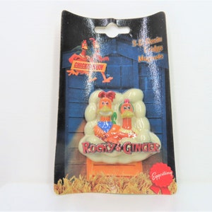 A vintage 1999 Chicken Run Rocky and Ginger resin fridge magnet in sealed packaging.