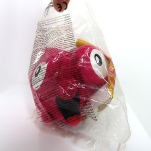 A vintage 2002 Treasure Planet Morph in original sealed bag.