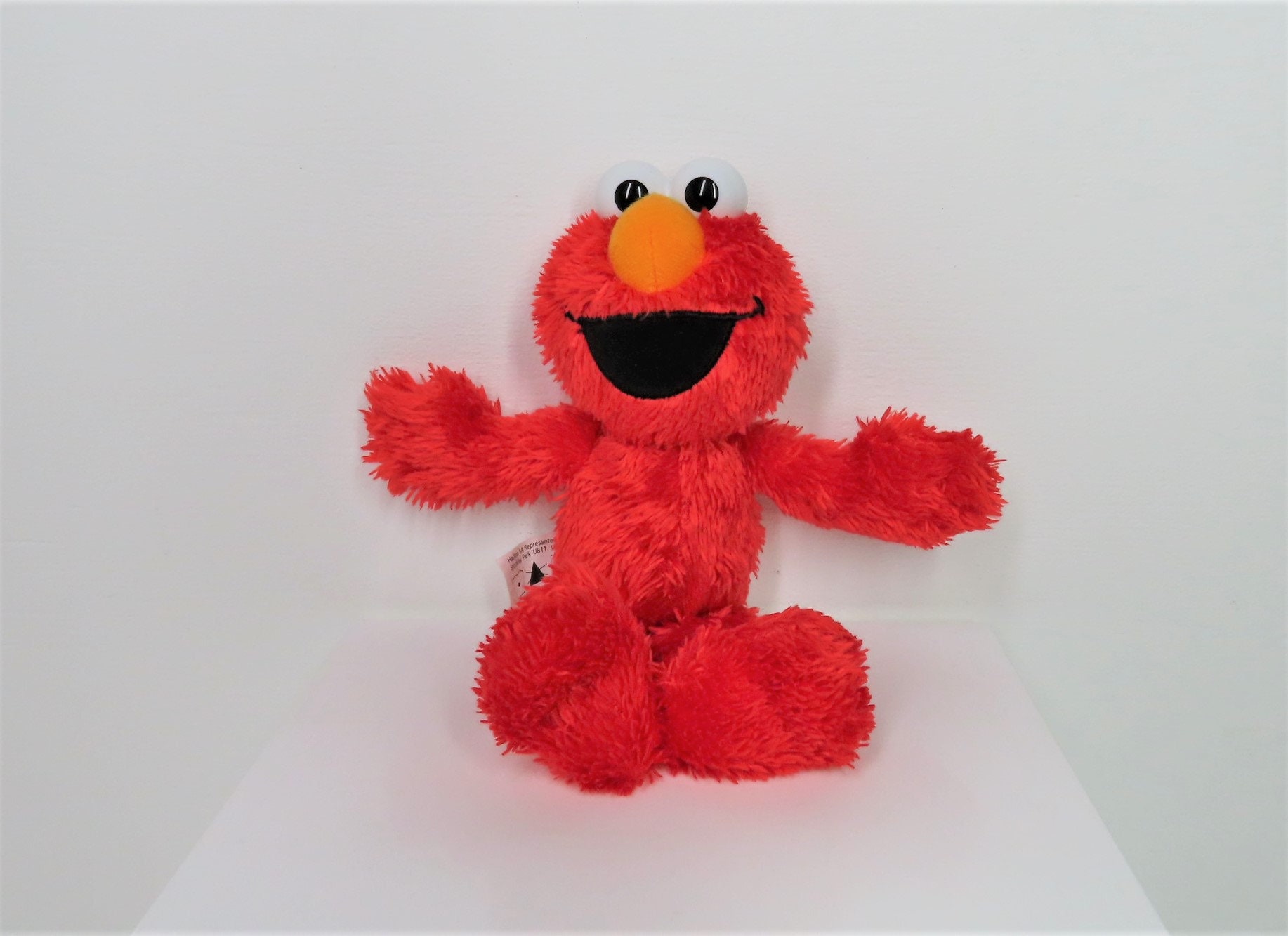 Een kleine pluche knuffel van Sesamstraat Elmo. - Etsy België