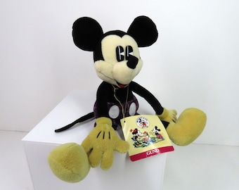 Vintage 1990s GUND Pie Eyed Mickey Mouse soft toy with swing tag.