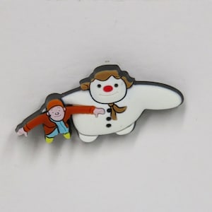 Ein Vintage Raymond Briggs The Snowman Pin.