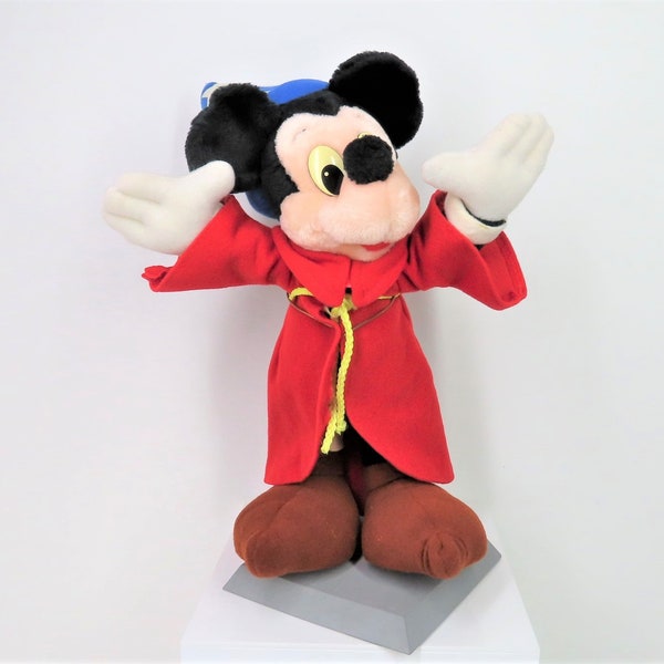 A vintage late 1970s - early 1980s Mickey Mouse Sorcerer plush toy.