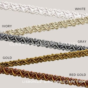 May include: Five samples of 1/2 inch wide gimp braid trim in different colors: white, ivory, gray, gold, and red gold. The trim has a decorative zig-zag pattern.