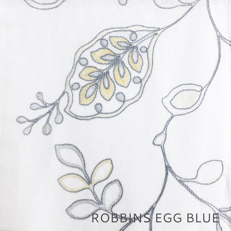 May include: White fabric with an embroidered pattern of gray and yellow leaves. The text "ROBBINS EGG BLUE" is printed at the bottom of the image.