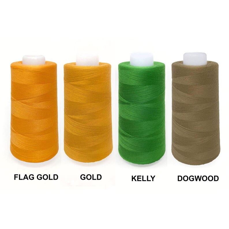 May include: Four spools of thread in different colors: Flag Gold, Gold, Kelly Green, and Dogwood. The spools are arranged in a row from left to right.