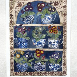 May include: A watercolor painting of a blue and white patterned teacup shelf with a variety of colorful primrose flowers in each cup. The shelf is framed with a brown and white floral border. The painting is signed "Auricular Theatre" and "Palfreeman".
