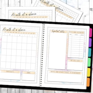 May include: A monthly planner with a calendar, important dates, bills and payments, a section for a big goal, and a notes section. The planner has a watercolor background with a rainbow color scheme.