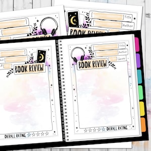 May include: A book review journal with a watercolor background and a black and white illustration of headphones, stars, and a crescent moon. The journal has a section for title, author, hours, and overall rating.