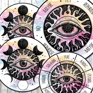 May include: Circular divination boards with an eye design, sun rays, and crescent moons. The boards feature text like "YES," "NO," and "MAYBE," with a watercolor background in pastel colours. The boards are black and white.