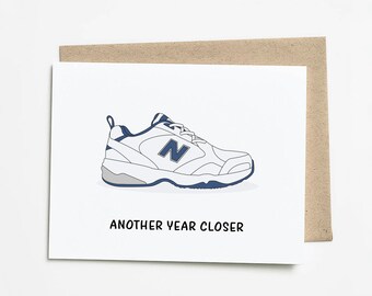 new balance 496 five rings