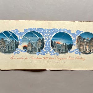 May include: A vintage Christmas card with a blue and white design featuring four illustrations of a house with a red roof. The card reads "Best wishes for Christmas 1940 from Cissy and Louis Sterling 1 Avenue Road Regents Park London N.W.8."