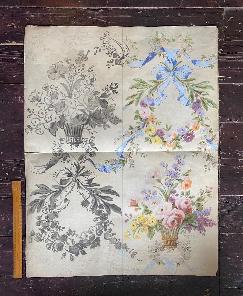 May include: A vintage wallpaper design featuring four different floral motifs. The design includes a bouquet of flowers in a basket, a wreath of flowers with a blue ribbon bow, and two different designs of wreaths with leaves and flowers.