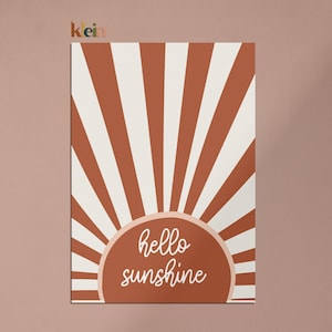May include: A digital illustration of a sun with red and white stripes and the text "hello sunshine" in a white cursive font.