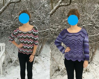 Two self-knitted sweaters with wave pattern