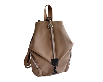 Stylish nude-colored backpack bag for women made of faux leather