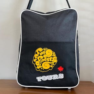 Borsa a tracolla nera in stile retrò, ideale per i tour di Fun Sun Finders, souvenir canadese.