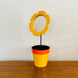 Espejo vintage Mod con forma de maceta: marco de plástico estilo Pop Art ajustable.