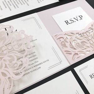 Elegante set di inviti di nozze con taglio laser bianco e rosa