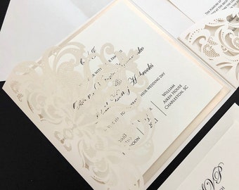 elegantes invitaciones de boda cortadas con láser en marfil y champán