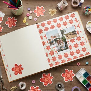 May include: An open scrapbook with floral patterned pages and photos, surrounded by craft supplies like colored pencils, buttons, washi tape, and watercolor paints. Decorative flower stickers are scattered around the scrapbook.