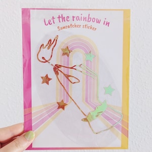 Adesivo acchiappasole a forma di mano esoterica, decorazione arcobaleno, adesivo olografico per finestre, adesivo a forma di stelle di fuoco a forma di mano, adesivo magico estivo