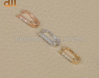 Cierre de diamante en oro de 14 k: un accesorio minimalista que realza las joyas.