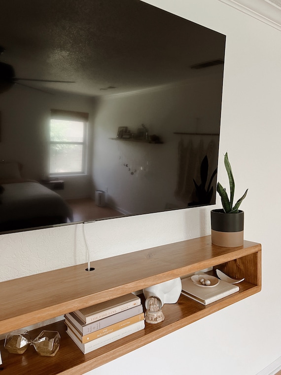 Floating wood console outlet