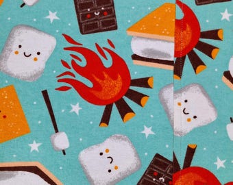 May include: A teal fabric pattern featuring a camping theme. The design includes cartoon marshmallows, chocolate bars, graham crackers, campfires, and stars. The marshmallows and chocolate bars have smiling faces. The overall design is whimsical and fun.