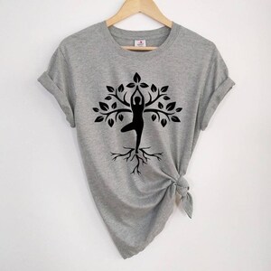 1. Artistic Harmony T-shirt For Yoga Online by Out of Order