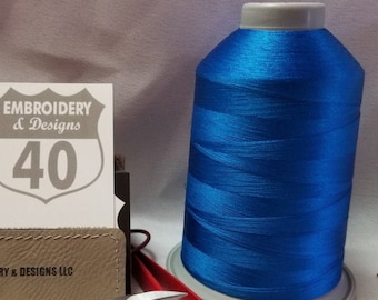 Electric Blue Glide polyester embroidery thread by Fil tec. Fewer thread breaks! King Spool 5500 yards. weight 40. Made in the USA. Trilobal