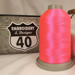 Embroidery Thread. Glide Trilobal Polyester by Fil tec. 40 weight. King spool 5500 or Mini 1100 yards. Fewer thread breaks! Made in the USA. Magenta