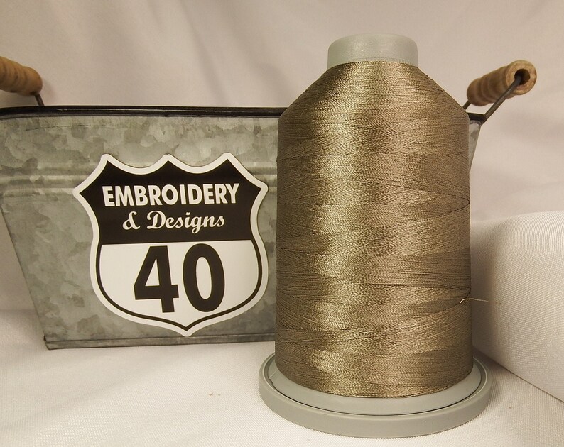 Embroidery Thread. Glide Trilobal Polyester by Fil tec. 40 weight. King spool 5500 or Mini 1100 yards. Fewer thread breaks! Made in the USA. Husky