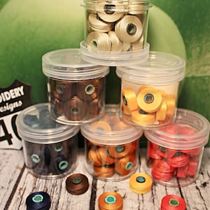 Magnetic bobbins, SIZE L, Pre-Wound Magna-Glide DELIGHT Fil-Tec bobbins. Free Shipping. Quantities of 10. Trilobal Polyester No 40
