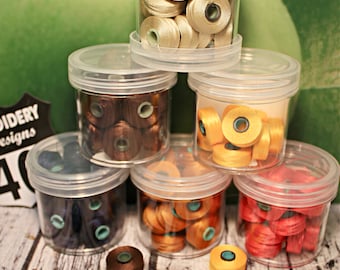Magnetic bobbins, SIZE L, Pre-Wound Magna-Glide DELIGHT Fil-Tec bobbins. Free Shipping. Quantities of 10. Trilobal Polyester No 40