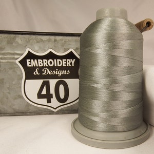 SILVER EMBROIDERY Thread Glide Polyester 5500 Yards, 40 wt.  King Large Spool. Made In USA!!  Coin 10429