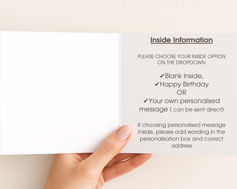 a person's hand holding a blank card with instructions on how to fill it out.