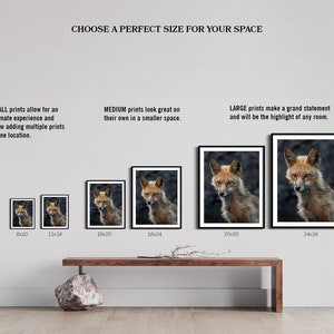May include: A comparison of different sizes of framed prints featuring a red fox. The prints are displayed on a white wall with a wooden shelf underneath. The text "CHOOSE A PERFECT SIZE FOR YOUR SPACE" is at the top of the image. The sizes of the prints are listed below each frame: 8x10, 11x14, 16x20, 18x24, 20x30, and 24x36.