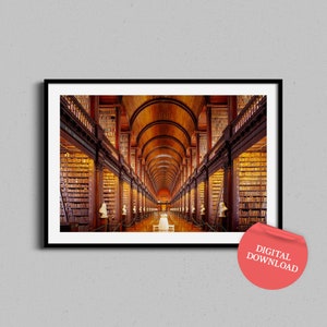 May include: A photograph of the long, high-ceilinged library of Trinity College in Dublin, Ireland. The library is lined with bookshelves filled with books, and the ceiling is arched and supported by columns. The library is lit by large windows, and the light creates a warm, inviting atmosphere.